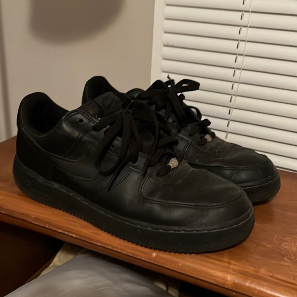 Air Force 1. All black. Low top. Size 10.5. Worn but still in decent condition.